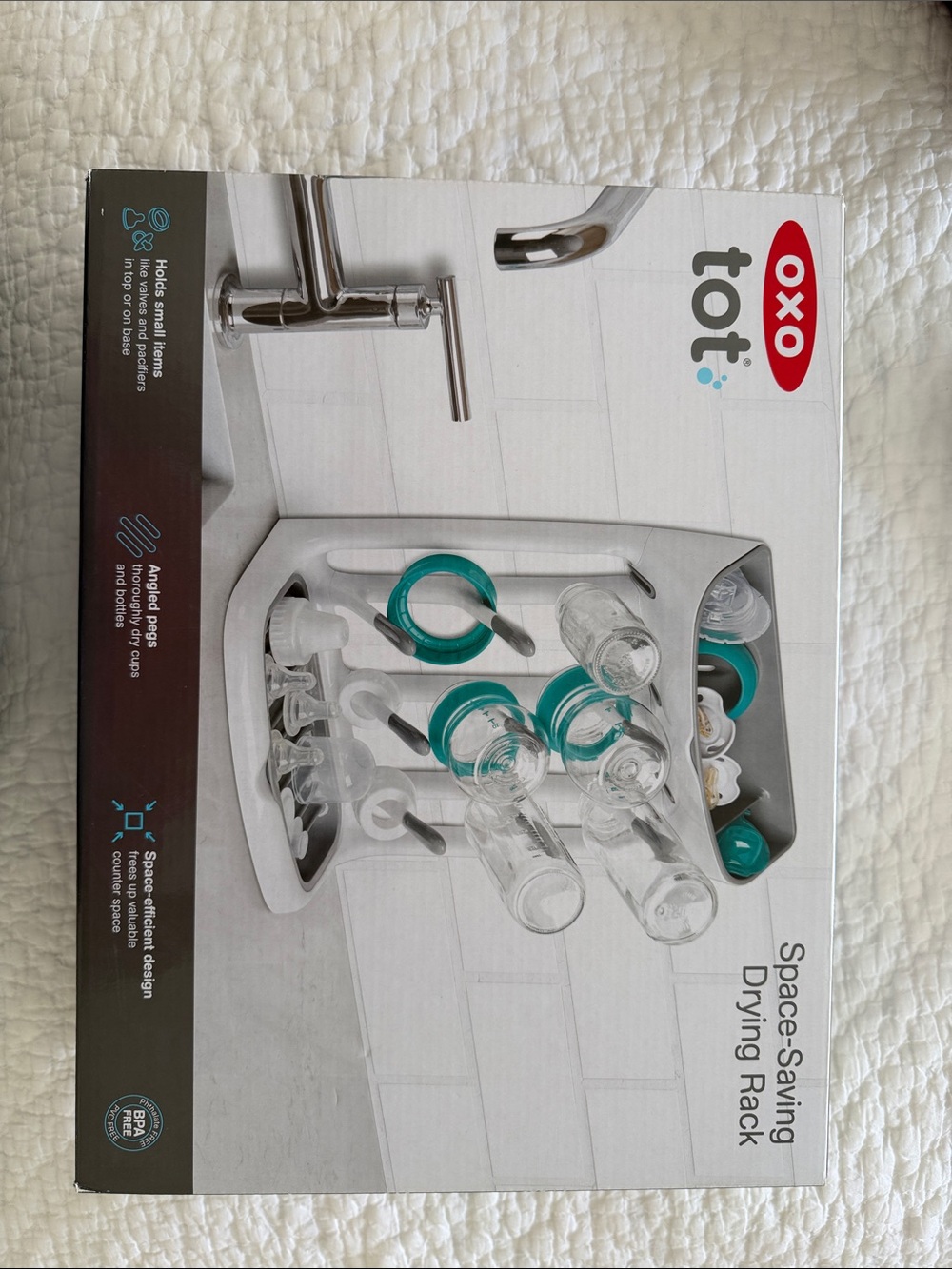 OXO Tot Space-Saving Drying Rack in White with Teal Accents